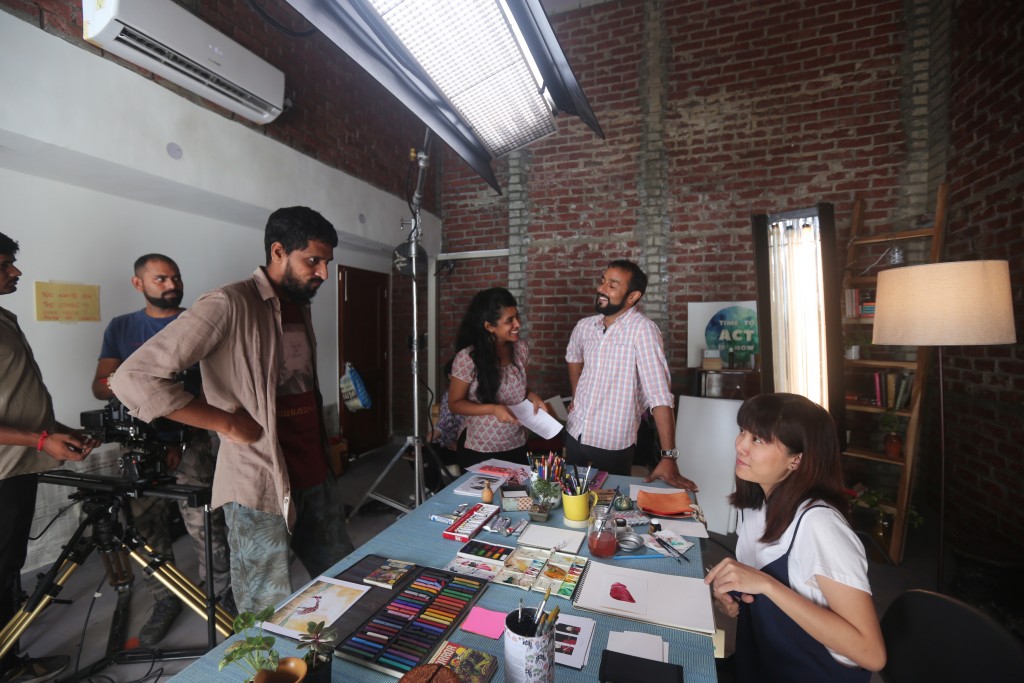 On the sets of the WHO project with Indonesian artist Grace Djiauw and longtime collaborator cameraman Karan Thapliyal (left)